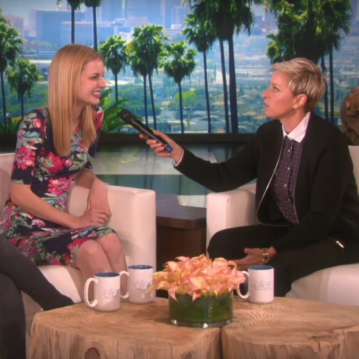 Carly on the Ellen show set, laughing as Ellen holds out a microphone